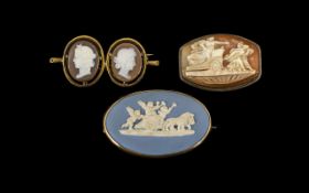 Three Cameo Brooches comprising a 1951 Wedgwood Jasper in gilt frame,