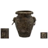 Chinese Bronze Vase - cast to the body with a coiling dragon, with lion mask handles.
