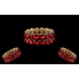 Bright Red Crystal Bracelet comprising a double row of large, dazzling red, square cushion crystals,