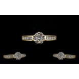 18 Carat Gold Attractive and Diamond Set Ladies Cluster Ring. Marked 750. 18ct to interior of shank.