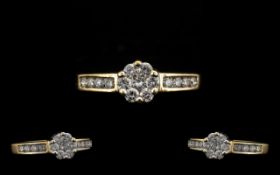 18 Carat Gold Attractive and Diamond Set Ladies Cluster Ring. Marked 750. 18ct to interior of shank.