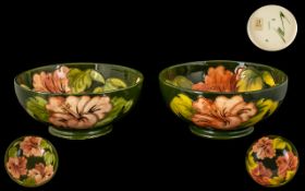 Moorcroft Pair of Tubelined Fruited Bowls (2) Coral Hibicus design on green ground circa 1940's