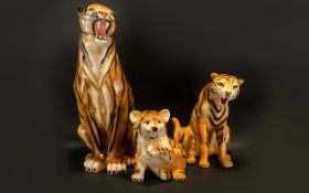 A Collection of Three Modern Ceramic Decorative Tiger Figures comprising of tall sitting tiger