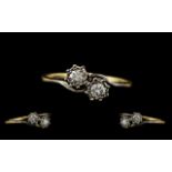 18ct Gold and Platinum Attractive Illusion Set Ring. The Two Round Brilliant Cut Diamonds, Clear and