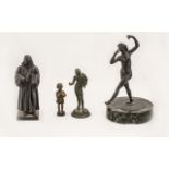 Collection of Four Small Figures comprising a bronze little girl praying and measuring 2.