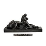 Art Deco Style Pottery Black Glazed Figure of a reclining Tiger on a base. Signed Laneranchi.
