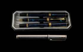 Schaeffer Boxed Pen along with three other modern boxed pens.