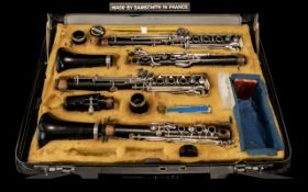 A Pair of Boosey & Hawkes Symphony 1010 Clarinets, in single fitted case with one mouth piece.