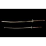 Copy Samurai Sword & Scabbard fitted with an alloy shuba with a braided wood handle. 40" in length.