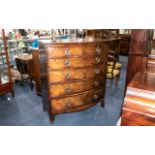 A Late Regency Period/ Georgian Large Bow Fronted Mahogany Chest with graduating drawers.