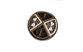 Antique Pressed Horn Roundel Brooch Piquet worked in gold depicting bees in four vignettes.