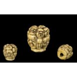 Japanese Meiji Period Carved Ivory Cane Walking Stick Knob carved with numerous comical faces,