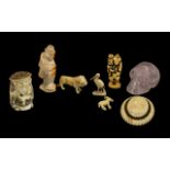 Mixed Lot of Carvings consisting of crystal skull, carved figure, cameo brooch,