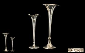 Silver Bud Vases hallmarked silver, both hallmarks rubbed, tallest 10" high, total 410 grams.