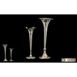 Silver Bud Vases hallmarked silver, both hallmarks rubbed, tallest 10" high, total 410 grams.