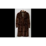 Ladies Fur Coat by W Creamer of Liverpool in chestnut brown, fully lined in brown sateen fabric.