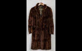 Ladies Fur Coat by W Creamer of Liverpool in chestnut brown, fully lined in brown sateen fabric.