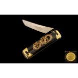 Modern Japanese Pocket Knife by Franklin Mint. Gold plated, with dragon logo.