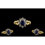 18ct Gold Attractive Sapphire and Diamond Set Cluster Ring - Flower head Setting. Mark 750 - 18ct.