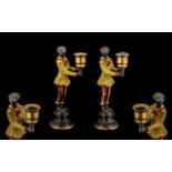 Pair of Cold Painted Bronze Candlesticks - in the form of Monkeys holding the candle holder on