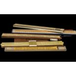 A Collection of Eight Vintage Sliding Calculating Rulers, various makers comprising (2),