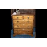 A Mahogany Chest of Drawers reconstructed from old parts with graduated drawers.
