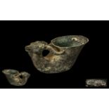 Chinese Archaic Bronze Deers Head Cup with green Patination character marks to the base. 5'' long, 2