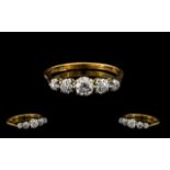 18ct Gold Diamond Ring Set With Five Graduating Old Round Cut Diamonds, Estimated Diamond Weight .