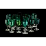 A Collection of Eighteen Victorian Green Coloured Wine Glasses with opaque stems.