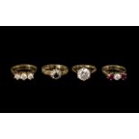 Collection Of Four 9ct Gold Rings, Single Stone CZ Solitaire, Three Stone CZ Ring,