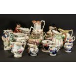A Collection of Antique Staffordshire Pottery Jugs (19) in total. From various factories.