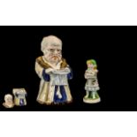 Antique Porcelain Lidded Jar in the form of an old gentleman wearing glasses and reading The Times