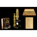 Vintage Microscope in wooden box fitted with slides,