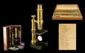 Vintage Microscope in wooden box fitted with slides,