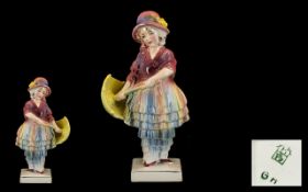 Katzhutte Porcelain Figure Early 20th Century Hand Painted figure of a young girl holding a parasol.