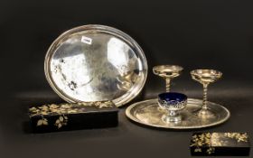 Collection of Plated Ware to include a silver plate round tray and a silver plate oval tray;