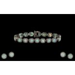 Silver Opal & White Sapphire Bracelet with matching earrings.