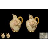 Royal Worcester Pair of Blush Ivory Helmet Shaped Jugs (2) each with handpainted floral decoration