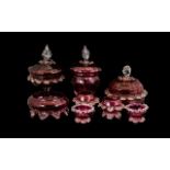 Collection of Eight Victorian Ruby Glass Items comprising of three lidded comport bowls four footed