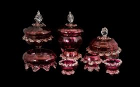 Collection of Eight Victorian Ruby Glass Items comprising of three lidded comport bowls four footed