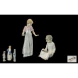 A Collection of Porcelain Figures 1. Nao girl in a nightdress carrying a candle stick 11 inches in