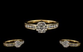 18ct Gold Attractive Flowerhead Diamond Set Dress Ring - marked 750 - 18ct.