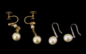 Two Pairs of Pearl Set Earrings on pair pearl drops on silver for pierced ears,