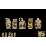 A Collection of Five Japanese Carved Ivory Netsuke depicting a Buddha,