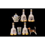Four Advertising Wade Pottery Scotch Whisky Bottles.
