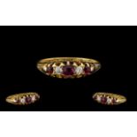 18ct Gold Attractive Edwardian Period Ruby & Diamond Set 5 Stone Ring in a gallery setting.