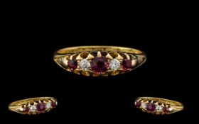 18ct Gold Attractive Edwardian Period Ruby & Diamond Set 5 Stone Ring in a gallery setting.