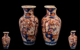 Pair of Imari Vases measuring 15" tall, one in as found condition, please confirm with photographs.