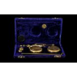 Set of Brass Miniature Apothecary Scales in velvet box, with weights.