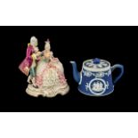 Dresden Porcelain Figure of a Courting Couple on a scroll gilt base with a jasper-ware adams blue